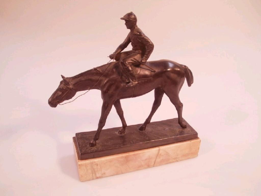 Appraisal: A 's bronze patinated white metal figure of a race