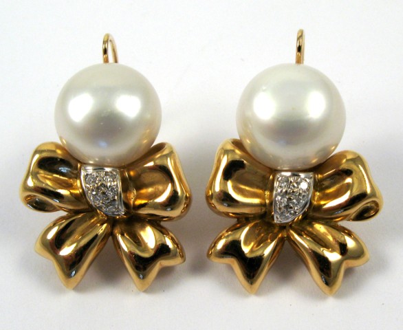 Appraisal: PAIR OF PEARL AND DIAMOND EARRINGS each k yellow gold