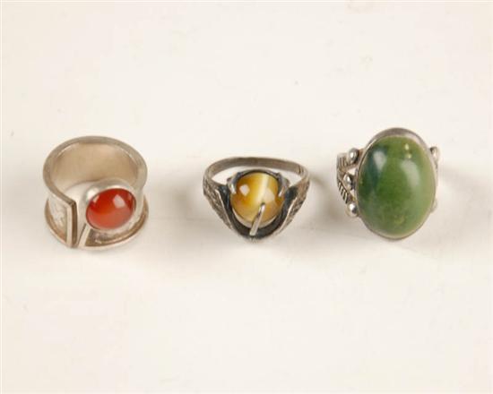 Appraisal: Three Sterling and Stone Rings one set with a green