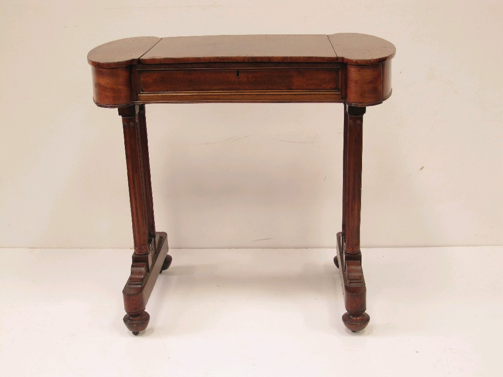 Appraisal: A Regency mahogany Writing Table with shaped top having hinged