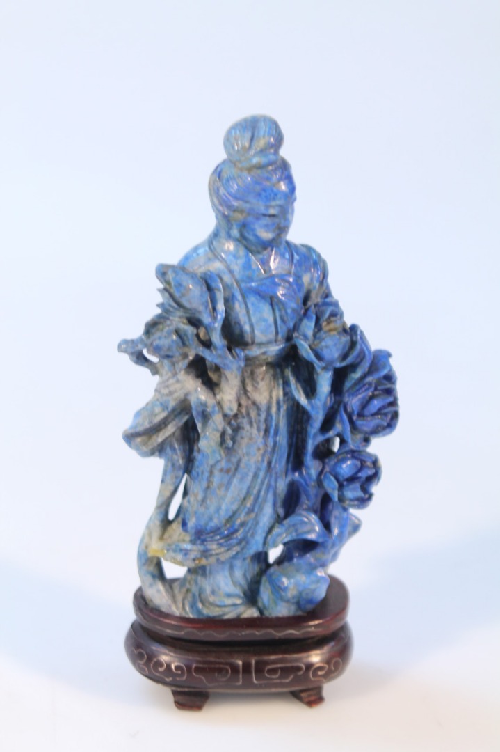 Appraisal: A lapis lazuli light figure of a geisha girl standing