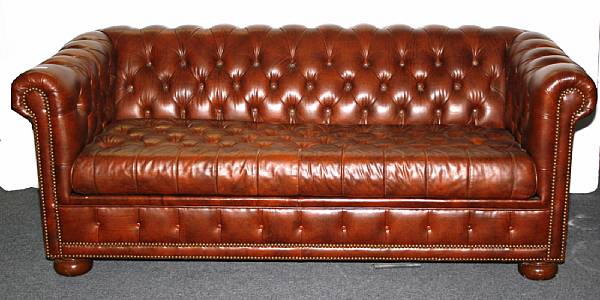 Appraisal: A Victorian style button tufted couch height in width ft