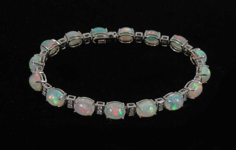 Appraisal: OPAL AND FOURTEEN KARAT WHITE GOLD BRACELET measuring - inches