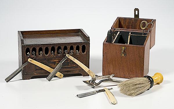 Appraisal: TWO EARLY OAK AND MAHOGANY BARBER RAZOR CASES includes one