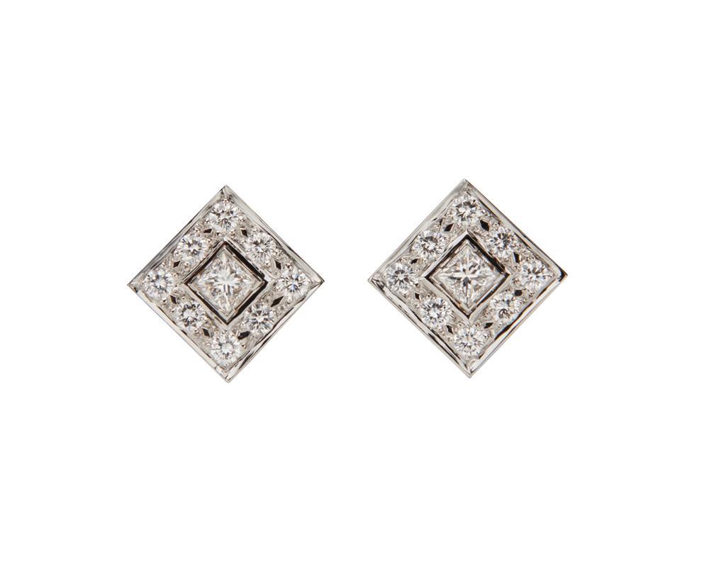 Appraisal: K and K Gold and Diamond Earrings each centering a