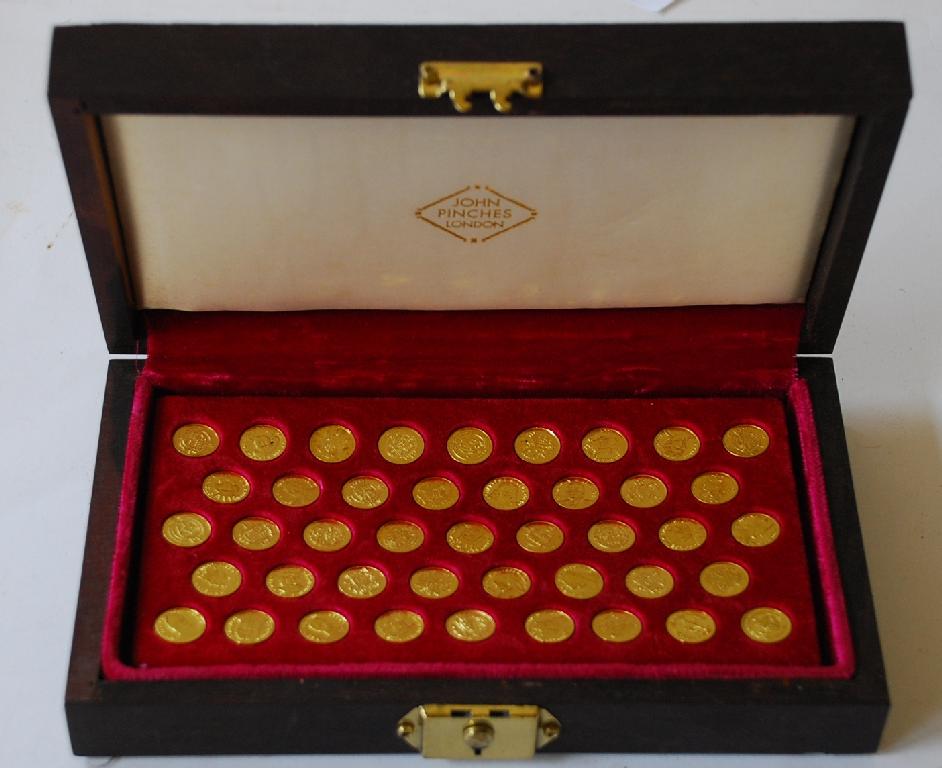 Appraisal: JOHN PINCHES LONDON BOXED SET OF SMALL ct GOLD COMMEMORATIVE