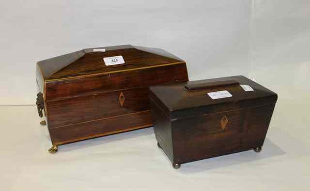 Appraisal: A REGENCY ROSEWOOD SARCOPHAGUS SHAPED BOX with inlaid decoration and