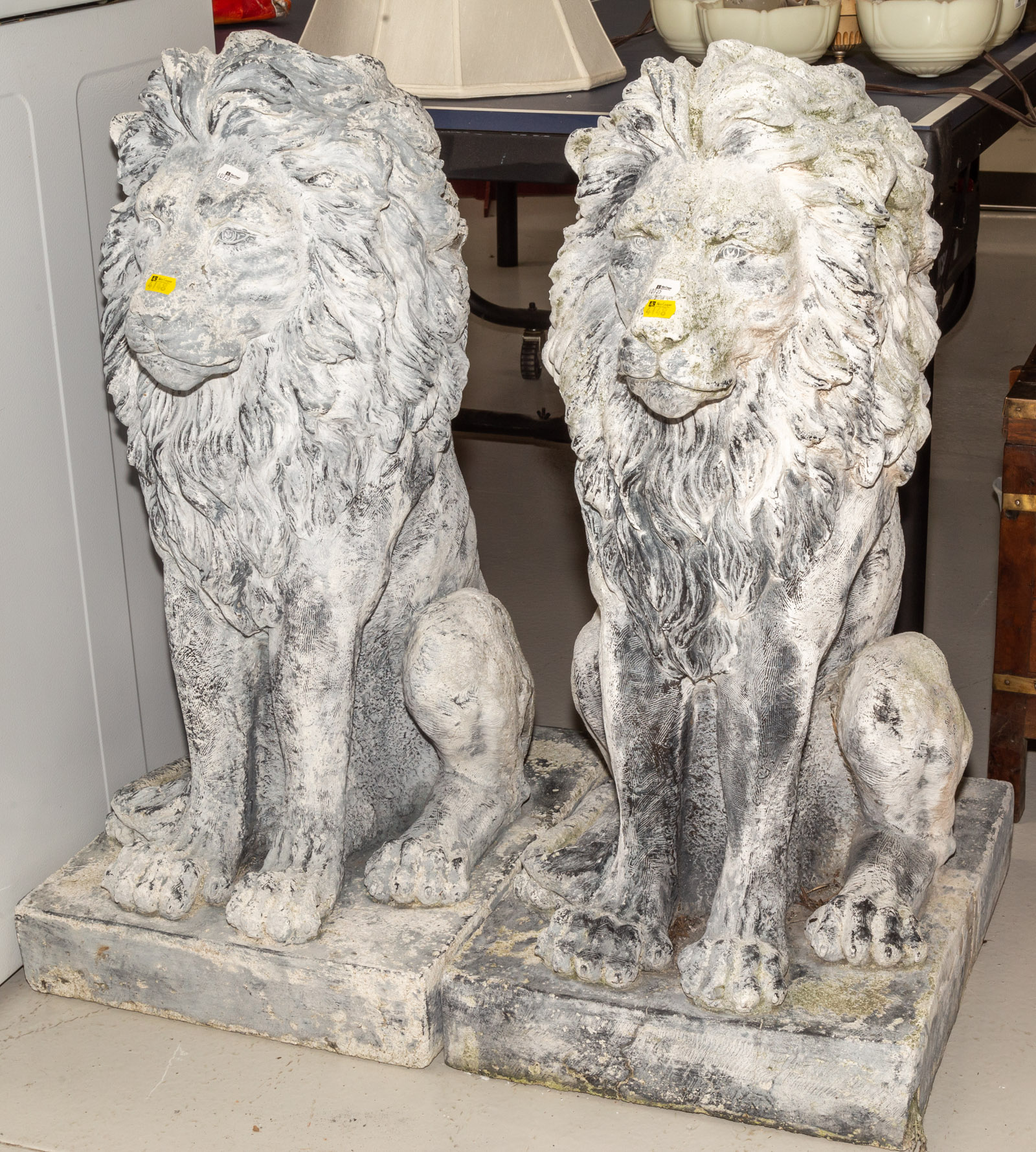 Appraisal: A PAIR OF GARDEN LION FIGURES Late th century painted