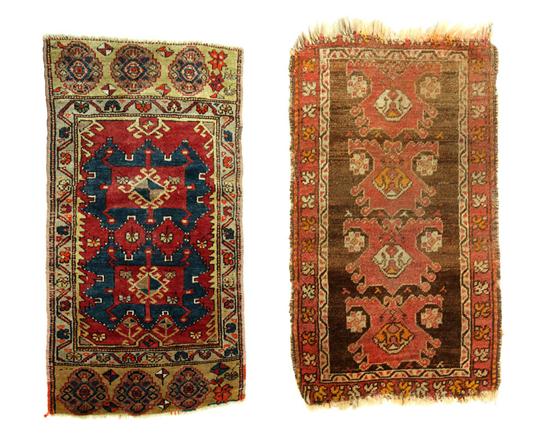 Appraisal: TWO ORIENTAL RUGS Anatol Camel with red and blue '