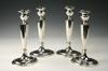 Appraisal: CANDLE STICKS - Set of four tall sterling weighted base