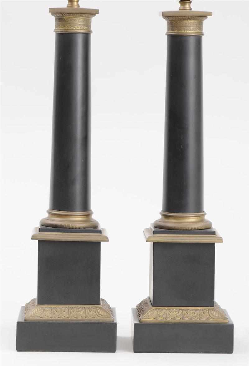 Appraisal: PAIR OF EMPIRE STYLE GILT-METAL MOUNTED BLACK ENAMELED COLUMNAR LAMPS