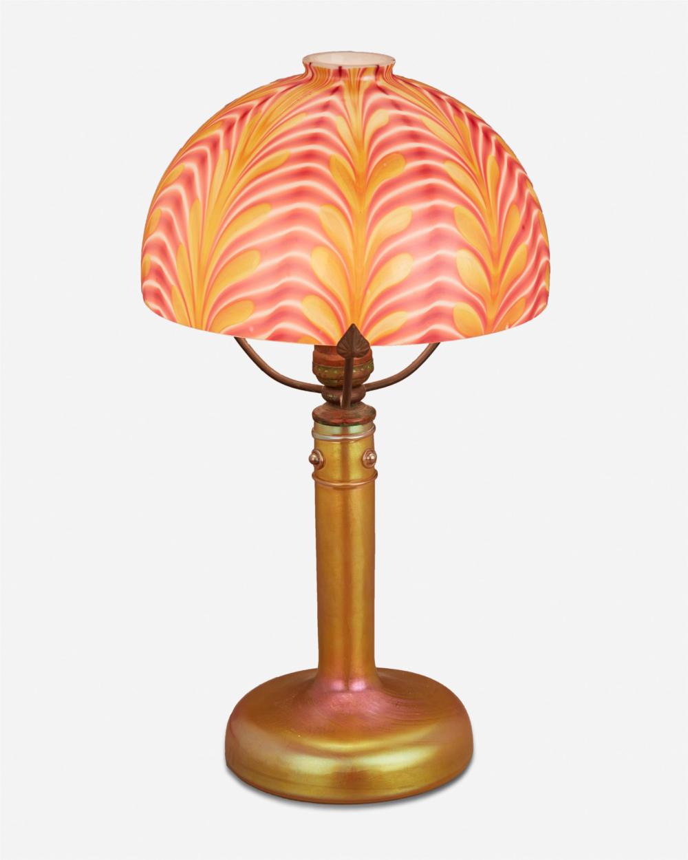 Appraisal: An iridescent art glass boudoir lamp First-quarter th Century The