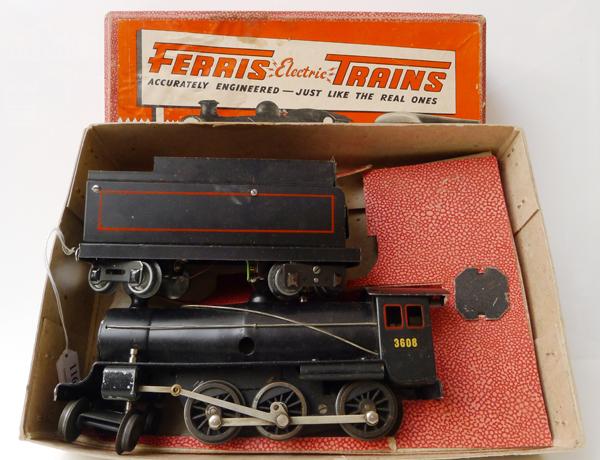 Appraisal: FERRIS ELECTRIC TRAINS LOCOMOTIVE AND TENDER BLACK AND RED LIVERY