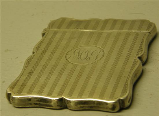 Appraisal: George V silver card case of serpentine form with engine