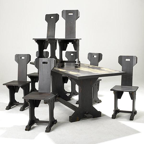 Appraisal: GOTHIC STYLE Tresle table and eight chairs probably cedar th