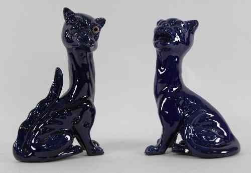 Appraisal: A Watcombe pottery one-eyed cat dark blue glaze cm high