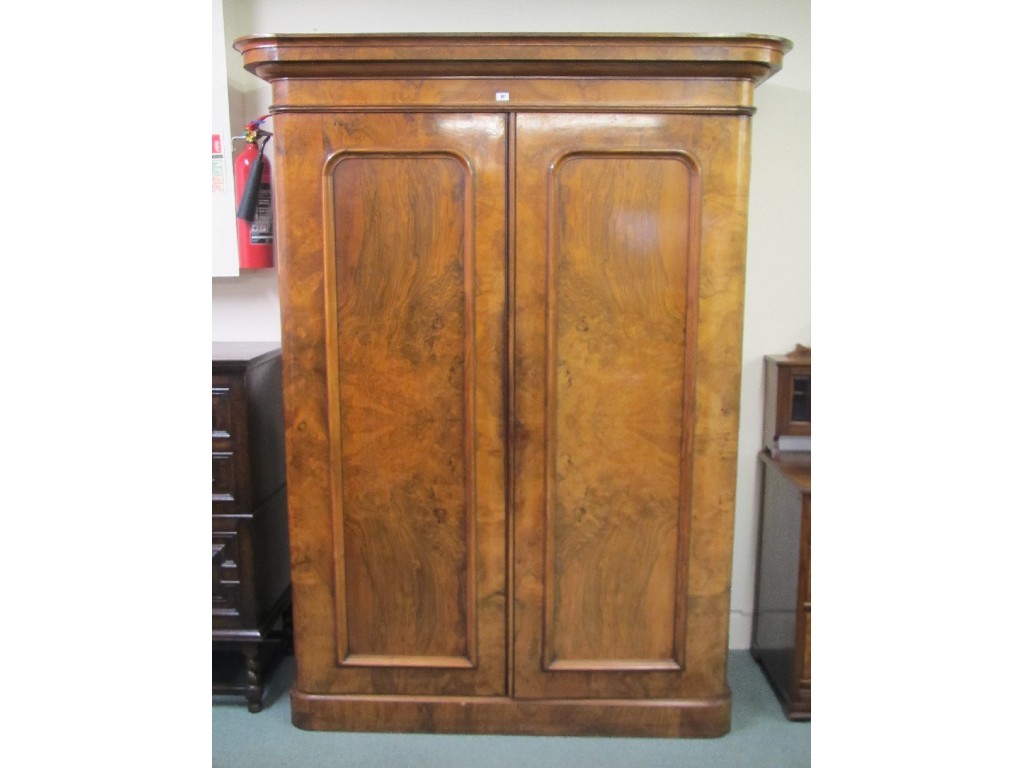 Appraisal: Victorian walnut wardrobe and a walnut dressing chest