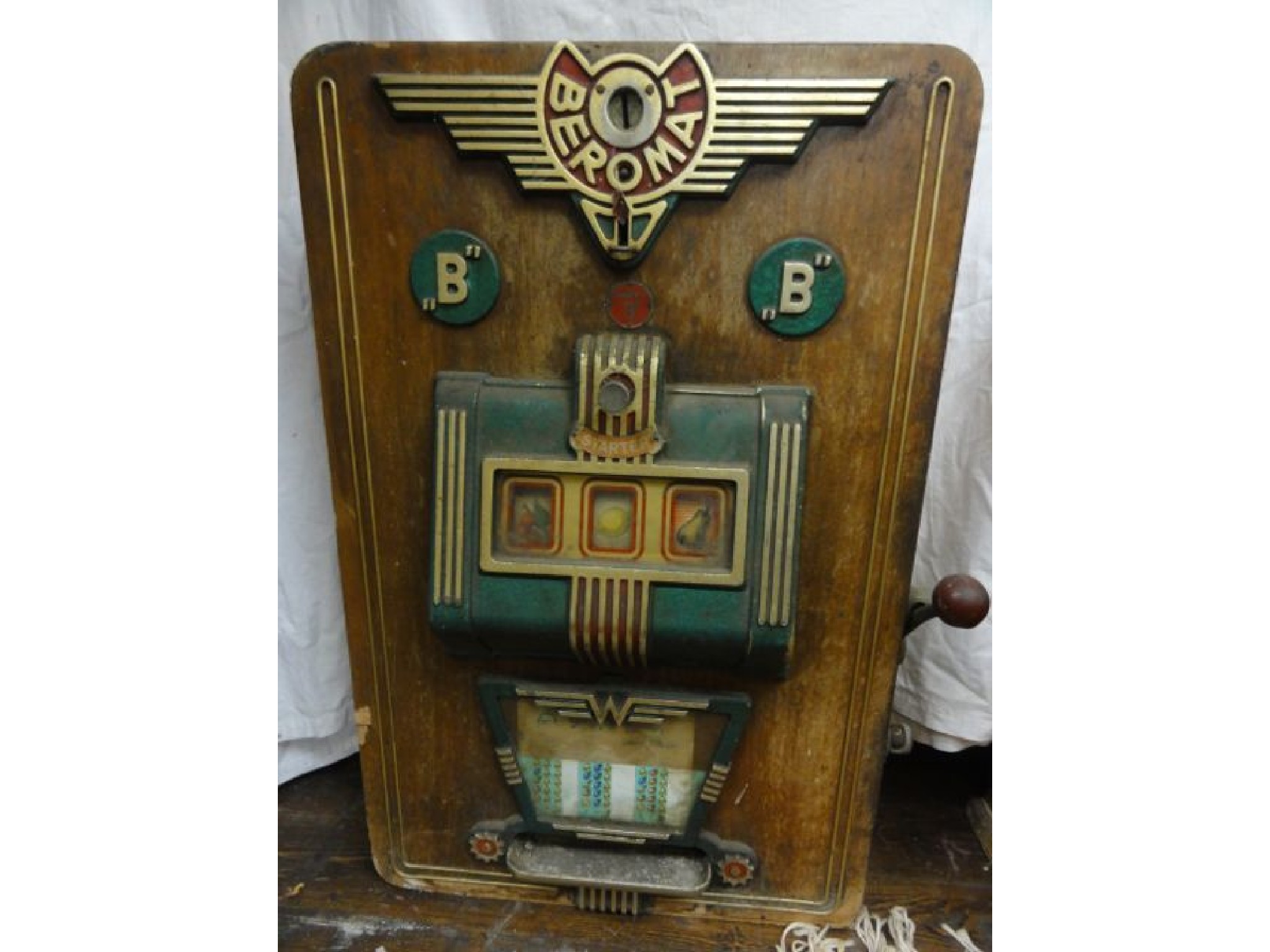 Appraisal: A Beromat one armed bandit type fruit machine with decorative