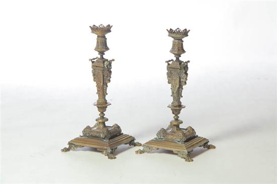 Appraisal: PAIR OF CANDLESTICKS European th century brass Elaborately adorned with