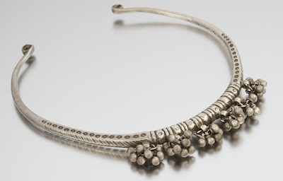 Appraisal: An Ethnographic Silver Choker Necklace Coin silver choker necklace with