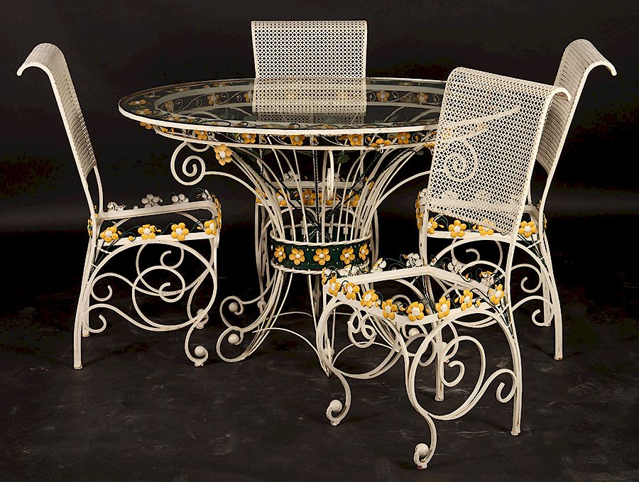 Appraisal: FRENCH WROUGHT IRON GARDEN TABLE CHAIRS A good French wrought