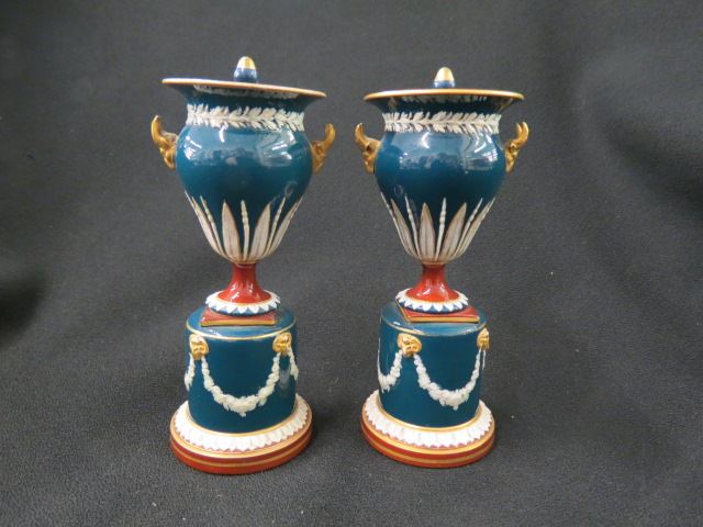 Appraisal: Pair of Wedgwood Glossy Jasperware Urns covered bolted pedestal bases