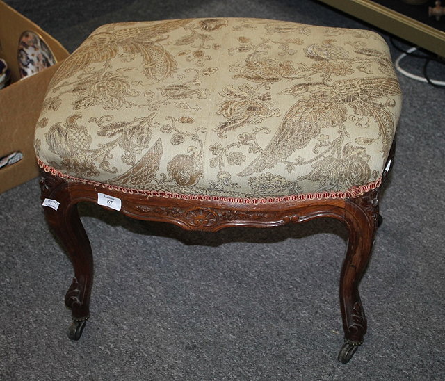 Appraisal: A VICTORIAN WALNUT STOOL of rectangular form on carved cabriole