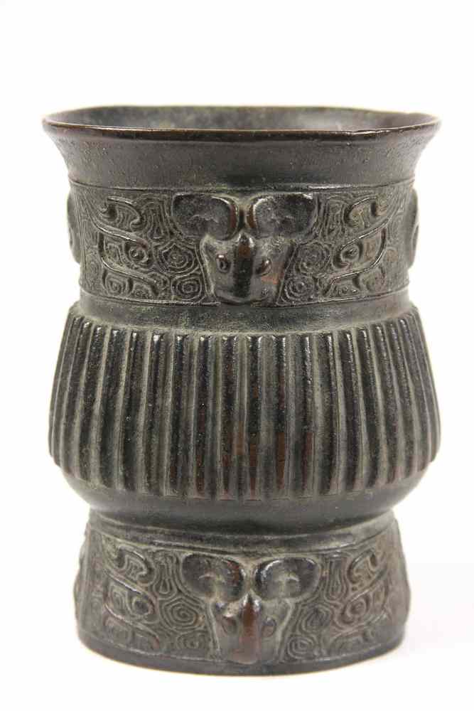 Appraisal: CHINESE BRONZE BEAKER - th c Archaic Style Cast Bronze