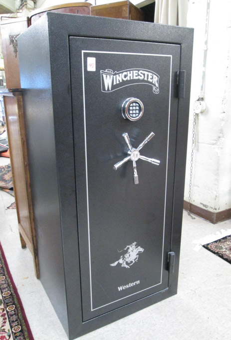 Appraisal: WINCHERS -GUN FLOOR SAFE Western model manufactured electronic combination lock