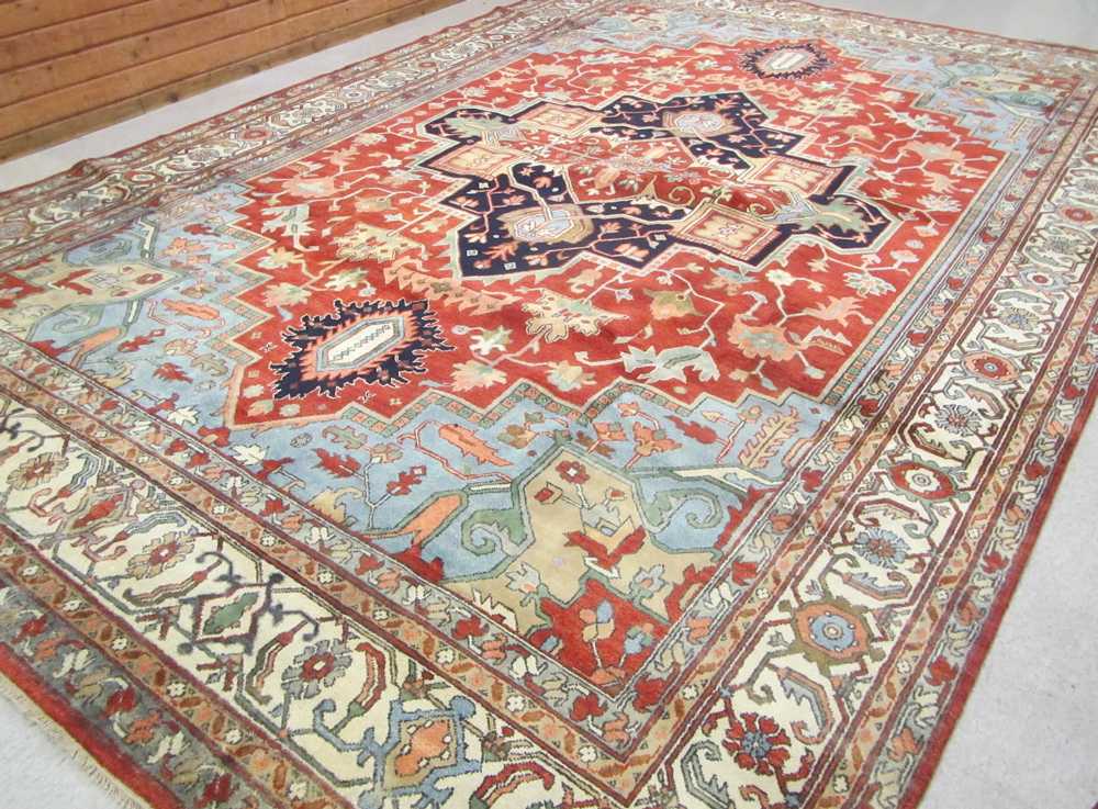 Appraisal: HAND KNOTTED ORIENTAL GRAND ROOM CARPET Persian Serapi design centering