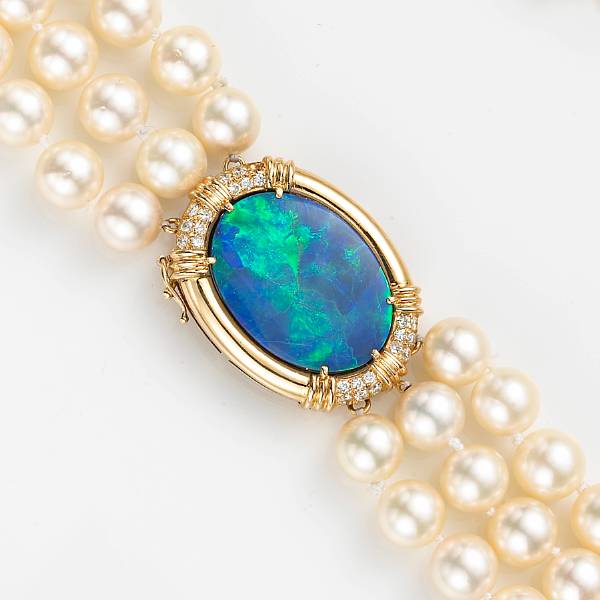 Appraisal: A cultured pearl opal doublet diamond and fourteen karat gold