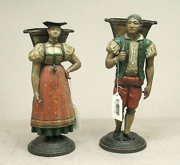 Appraisal: A pair of German painted t le figural bouquetiere th