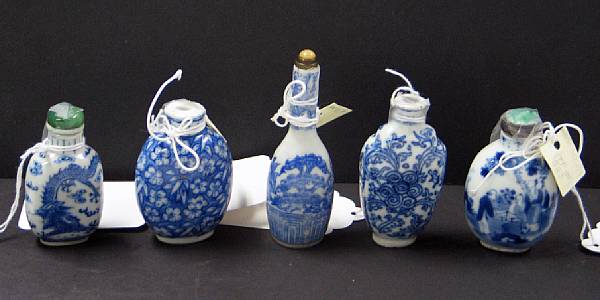 Appraisal: Five blue and white porcelain snuff bottles The first decorated