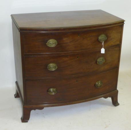 Appraisal: A GEORGE III MAHOGANY CHEST th century of bowed form