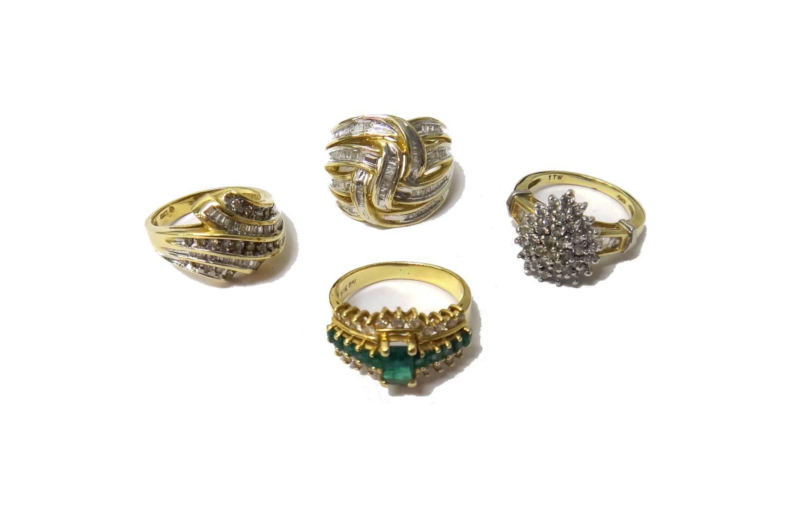 Appraisal: A gold emerald and diamond set ring claw set with