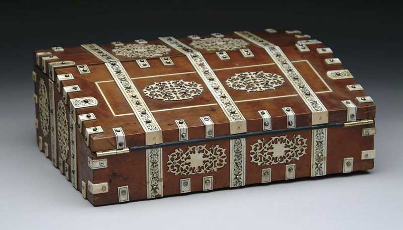 Appraisal: OUTSTANDING ANGLO INDIAN LAP DESK Light wood case adorned with