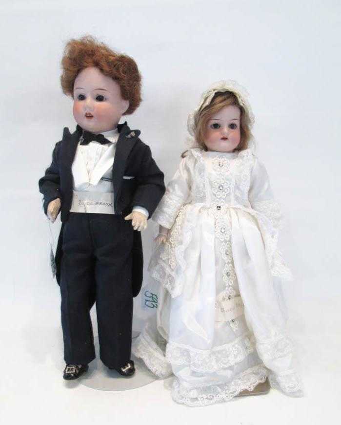 Appraisal: BRIDE AND GROOM BISQUE SOCKET HEAD DOLLS bride by Armand