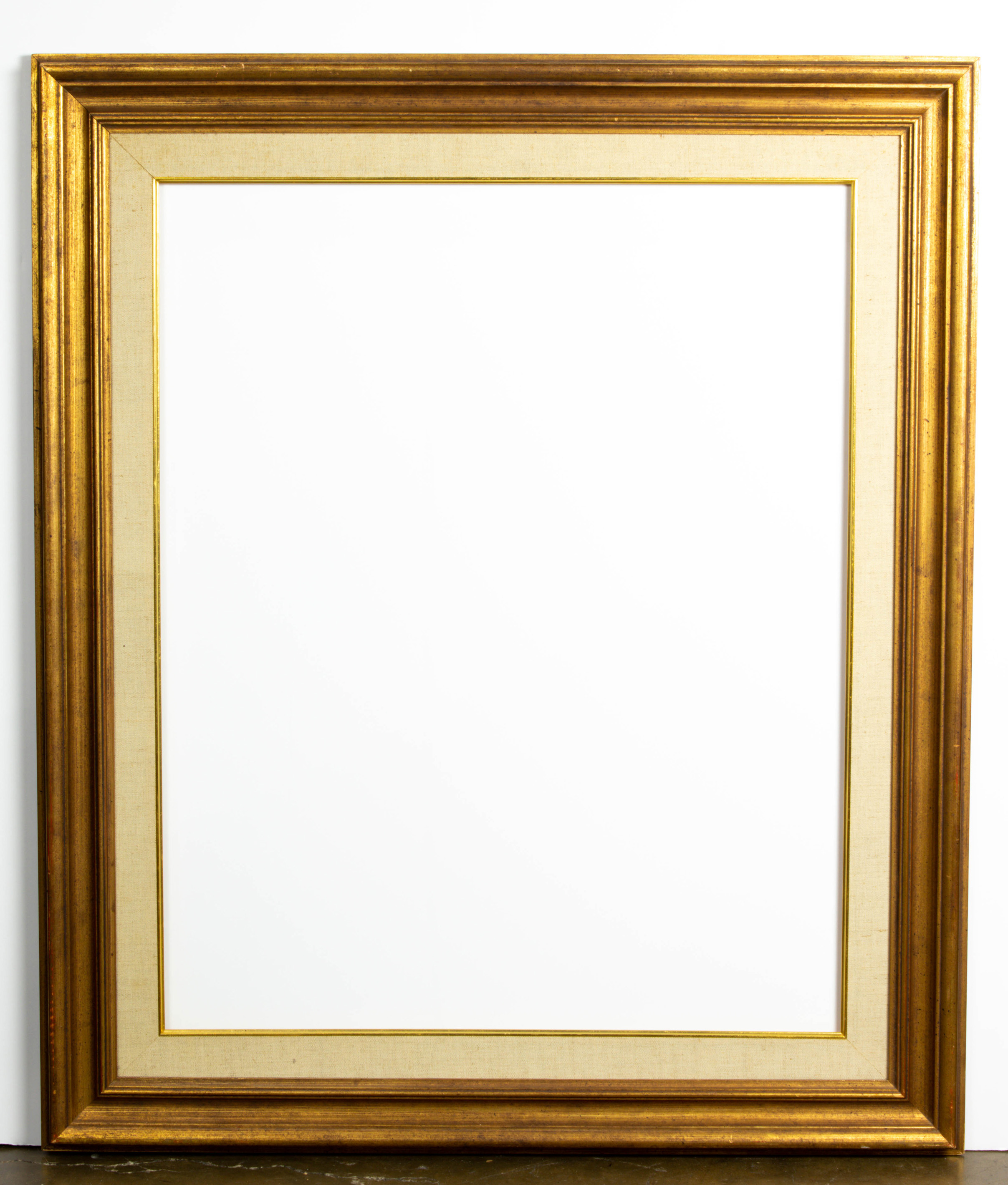 Appraisal: BURNISHED GILT WOOD FRAME WITH LINEN SLIP RABBETT H X