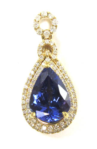 Appraisal: TANZANITE DIAMOND AND YELLOW GOLD PENDANT The k gold pendant