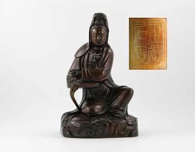 Appraisal: A large Chinese bronze figure of Guanyin seated resting her