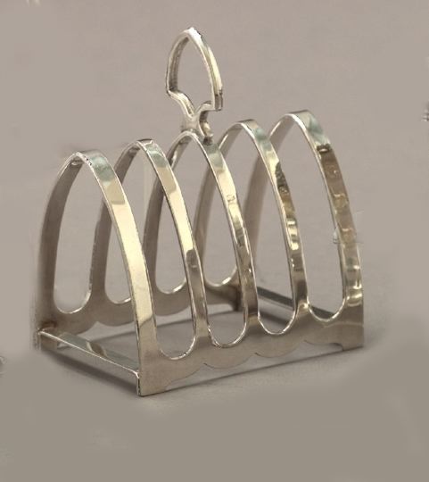 Appraisal: Edwardian Sterling Silver Four-Slot Toast Rack London maker JHP of