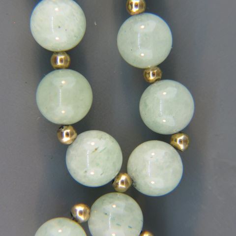 Appraisal: Jade Necklace beads mm k yellow gold space long