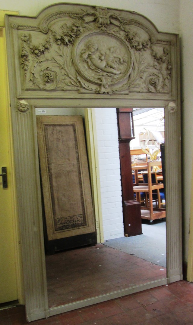 Appraisal: A th century grey painted trumeau wall mirror the upper