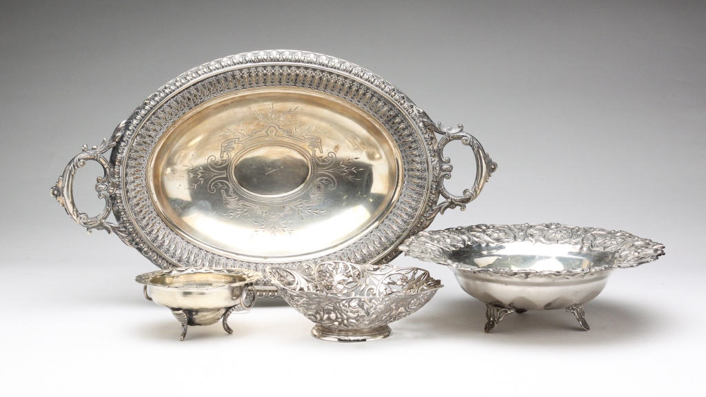 Appraisal: Twentieth century Including an silver footed basket w repousse floral