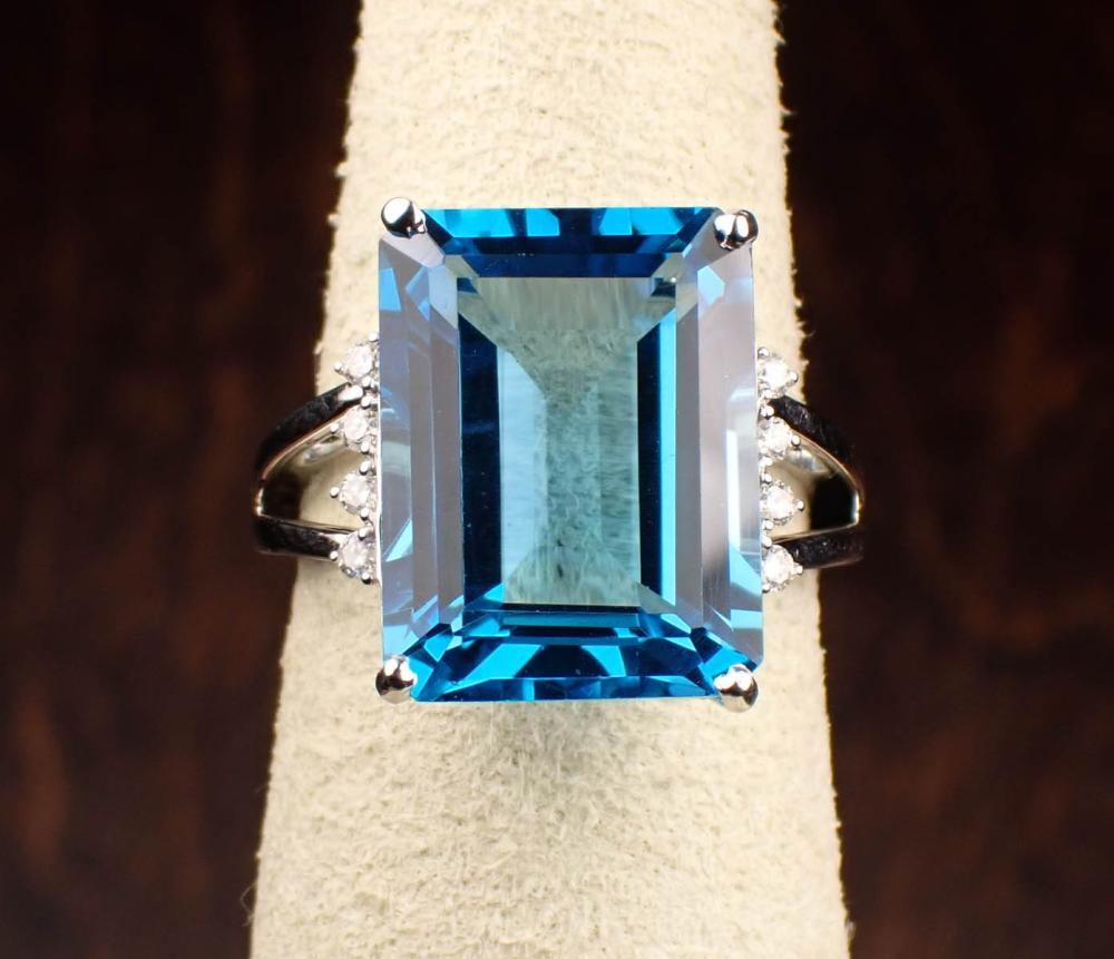 Appraisal: BLUE TOPAZ DIAMOND AND FOURTEEN KARAT GOLD RING The white