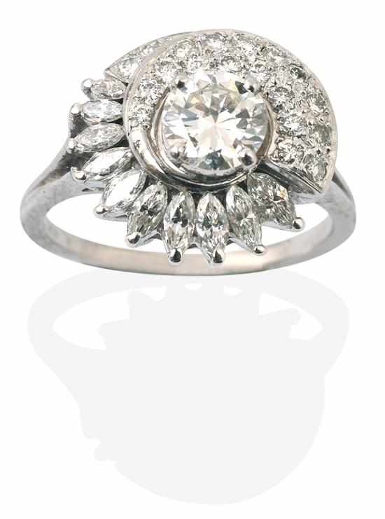 Appraisal: A DIAMOND COCKTAIL RING Centrally set with a round brilliant