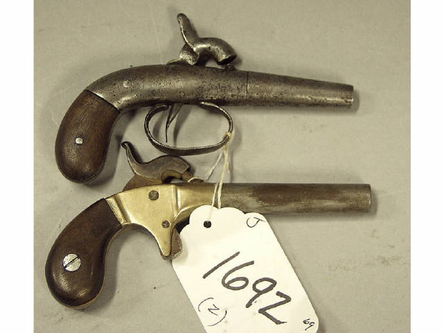 Appraisal: Pair antique percussion muff pistols Estimate -