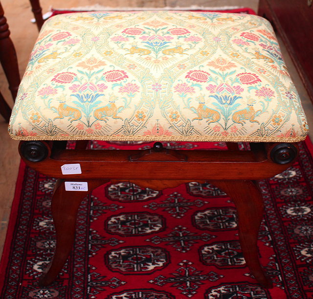 Appraisal: AN EMPIRE STYLE MAHOGANY STOOL with overstuffed upholstered seat resting