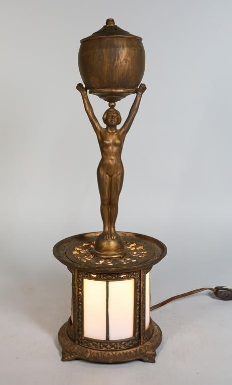 Appraisal: German figural art deco lamp painted iron with slag glass