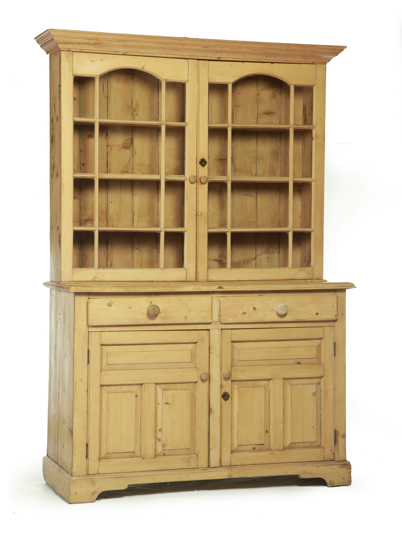 Appraisal: PINE ONE-PIECE STEPBACK CUPBOARD English th century Molded cornice multi-paned